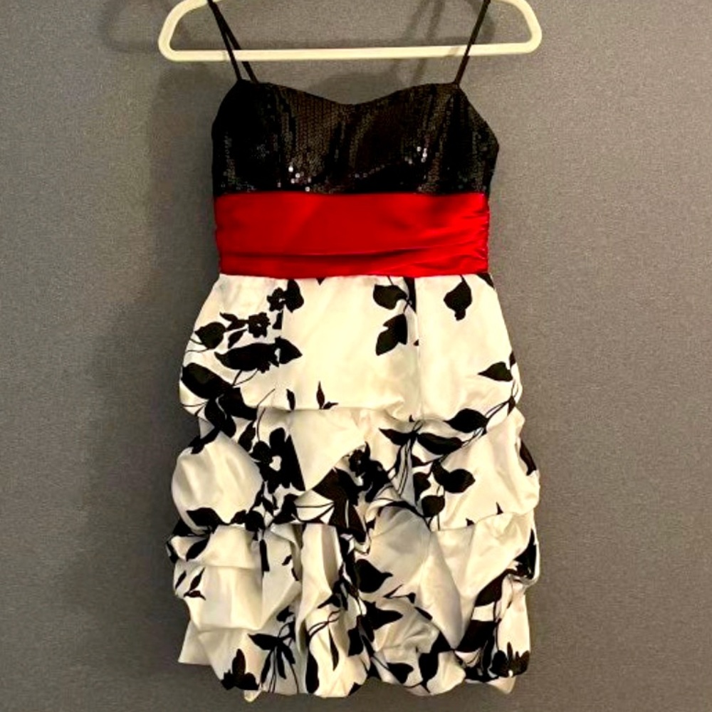 Cocktail dress in satin fabric with black top sequins